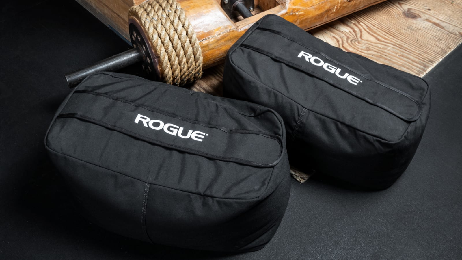 Rogue strongman deals sandbag workout